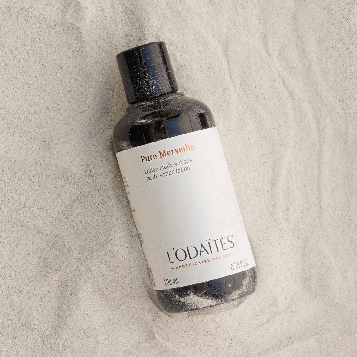 L'Odaïtès multitasking lotion on sand